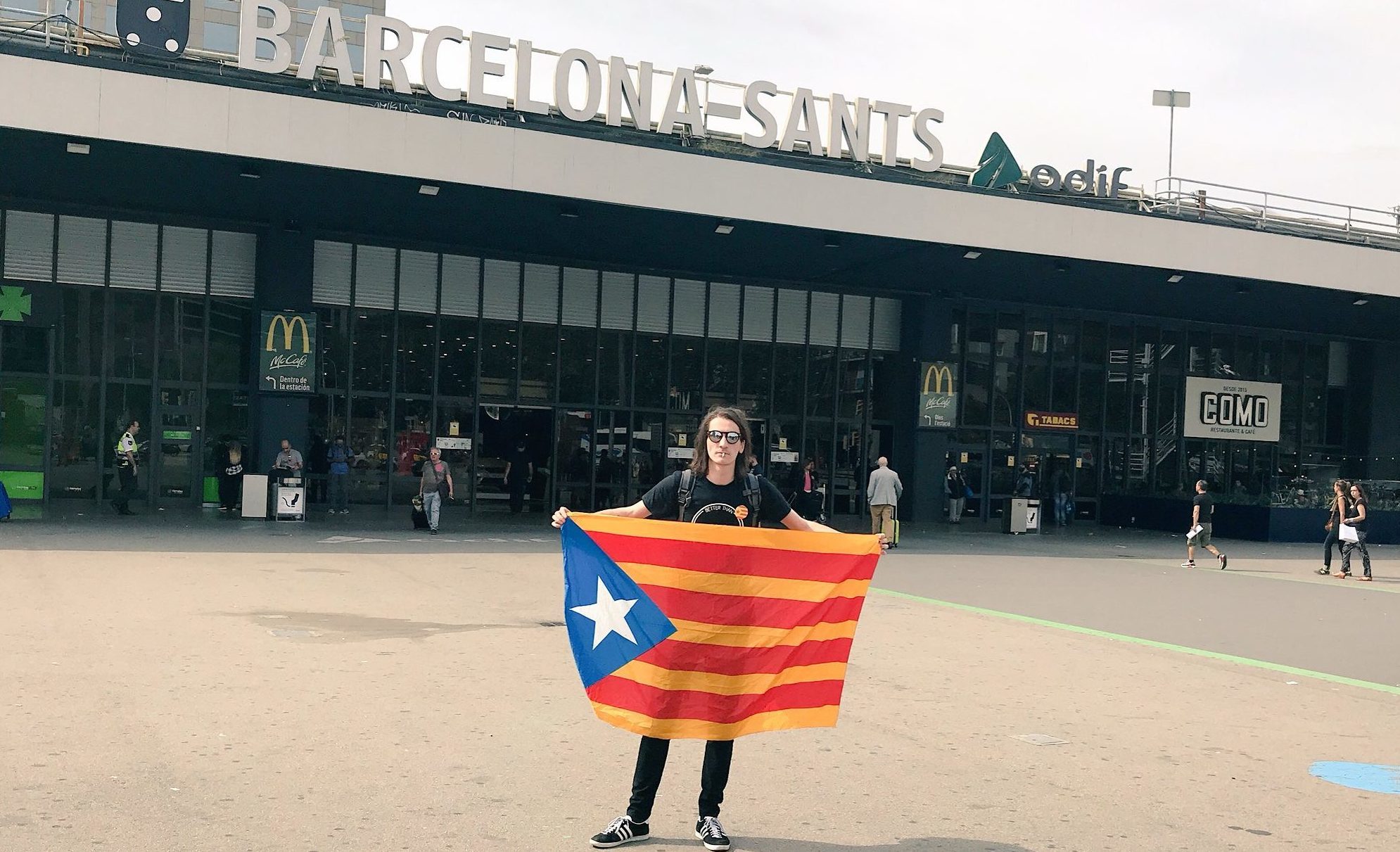 Tam and his friend were stopped and "intimidated" by Spanish police.