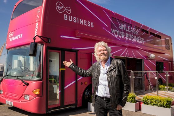 Sir Richard Branson with Virgin Media Business' Voom bus.