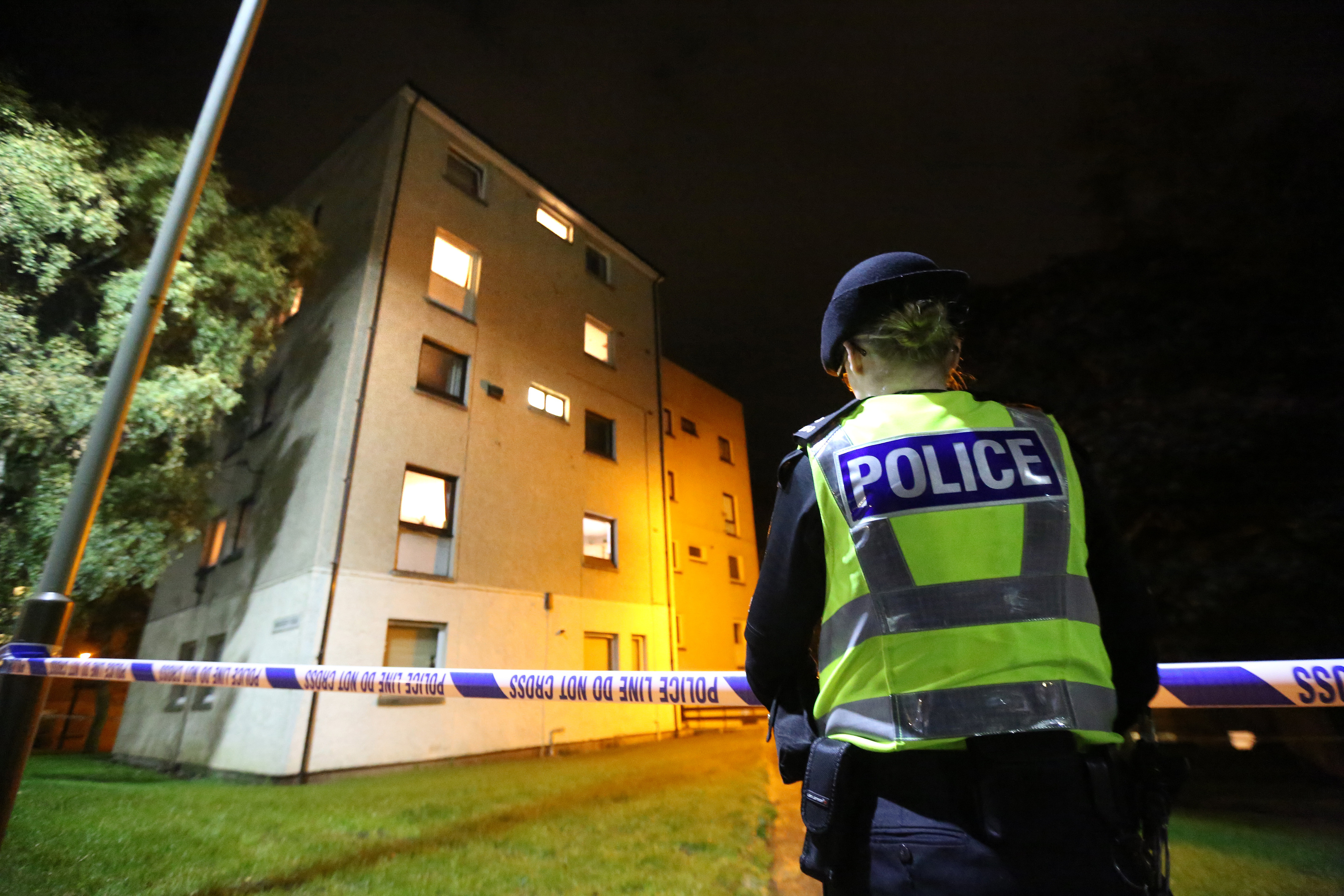 Police outside the flat in Nursery Road on the night of the incident.