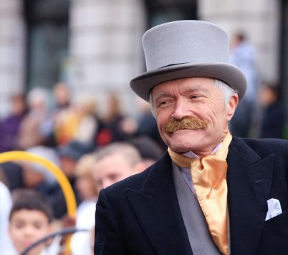 "London, United Kingdom - January 01, 2012: A man dressed up as a Victorian gentleman at the New Year's Day parade in London. On The Mall."