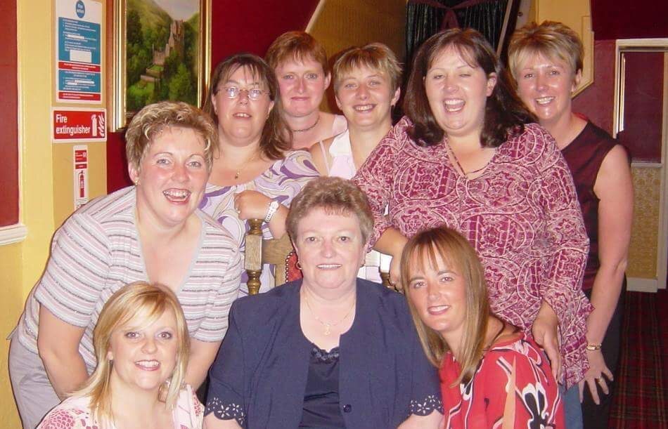 Mags Black (centre) at a reunion event with some of the girls from the Sea Cadet unit