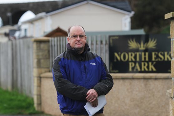 Gordon Stalker with the FOI at the site entrance,