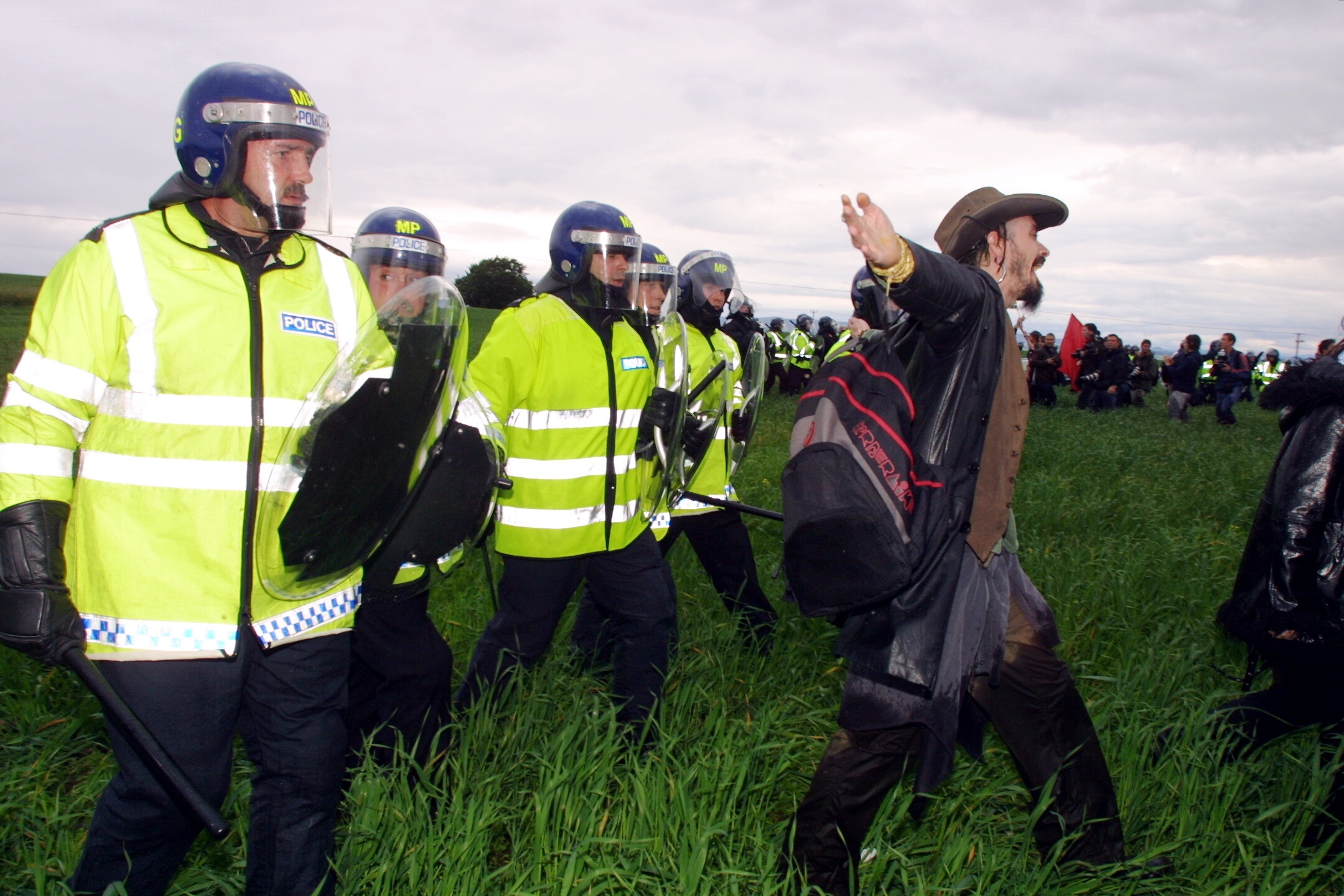 Police force protestors from the perimeter fence at Gleneagles Hotel during the G8 summit..