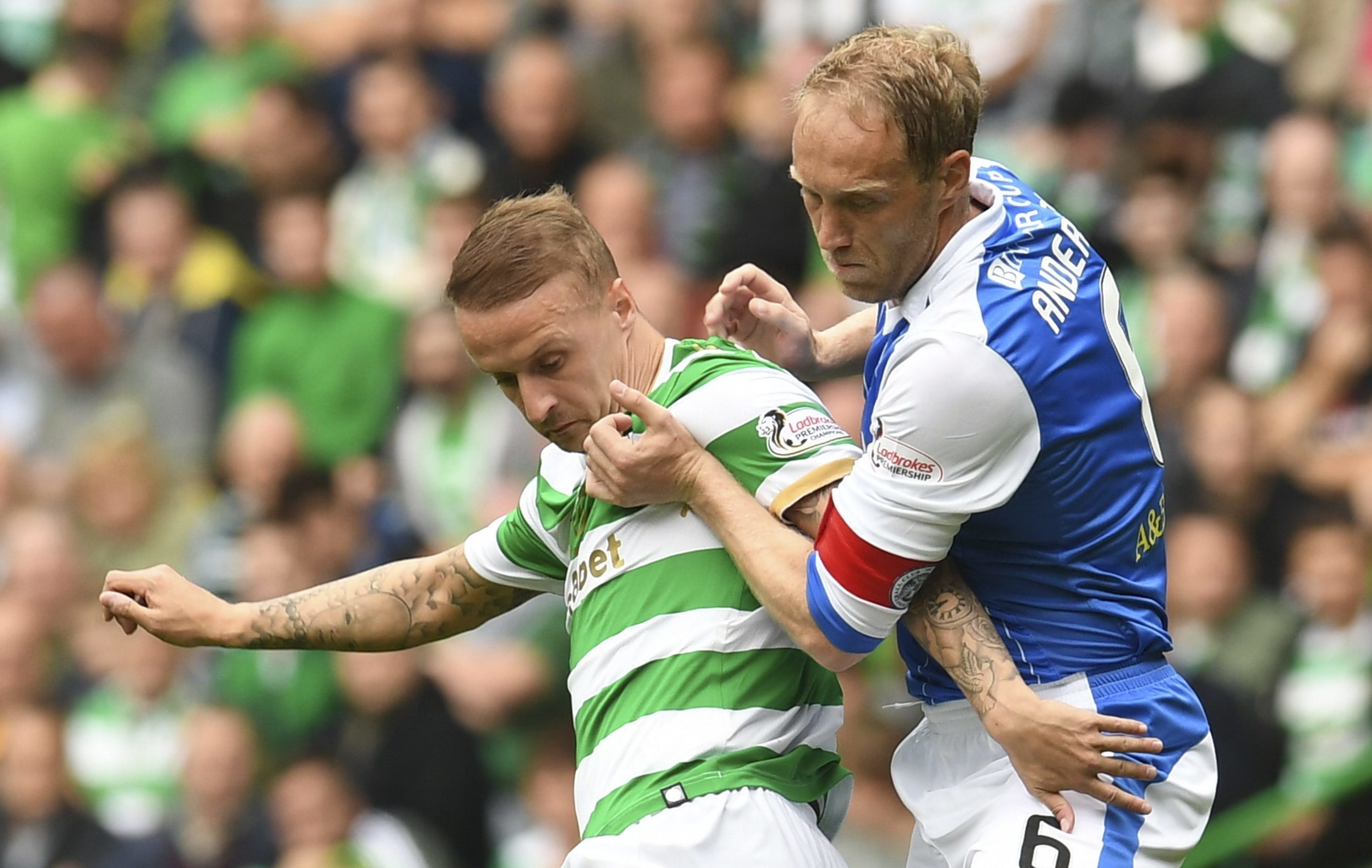 Steven Anderson in action against Celtic striker Leigh Griffiths.