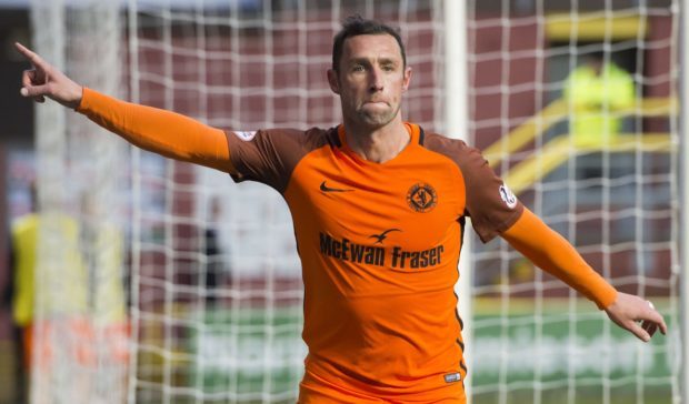 Scott McDonald celebrates his goal against Falkirk.