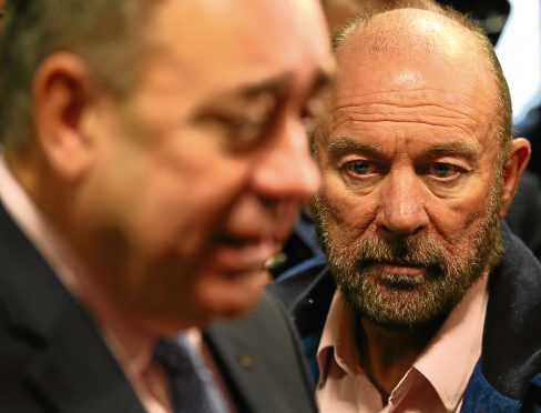 First Minister Alex Salmond is watched by businessman Brian Souter ahead of the independence referendum in 2014.