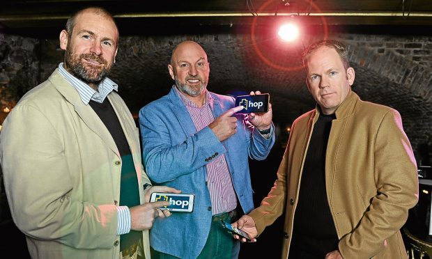 Richard Drummond, owner of McKays Hotel in Pitlochry, (centre) with HOP Software investors Jon Erasmus (left) and Ronald Tweedie (right).