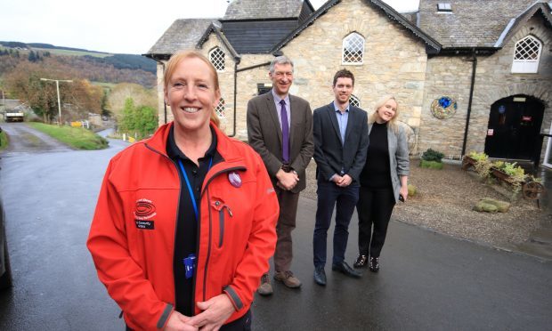 Aberfeldy Community warden Norma Carr  with (left to right) Councillor Mike williamson, Neil Christison of VisitScotland and Jennifer McOmish Safer Community Officer.