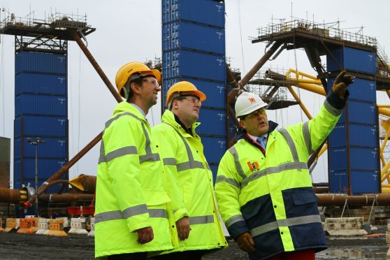 BiFab managing director Martin Adam (right) gives Energy Minister Paul Wheelhouse and Jan Matthiesen of the Carbon Trust a tour of BiFab Methil yard