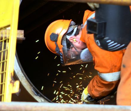 A welder at work at BiFab Methil