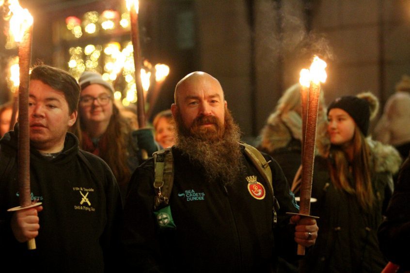 The torch-lit procession through Dundee ahead of the switch-on event.