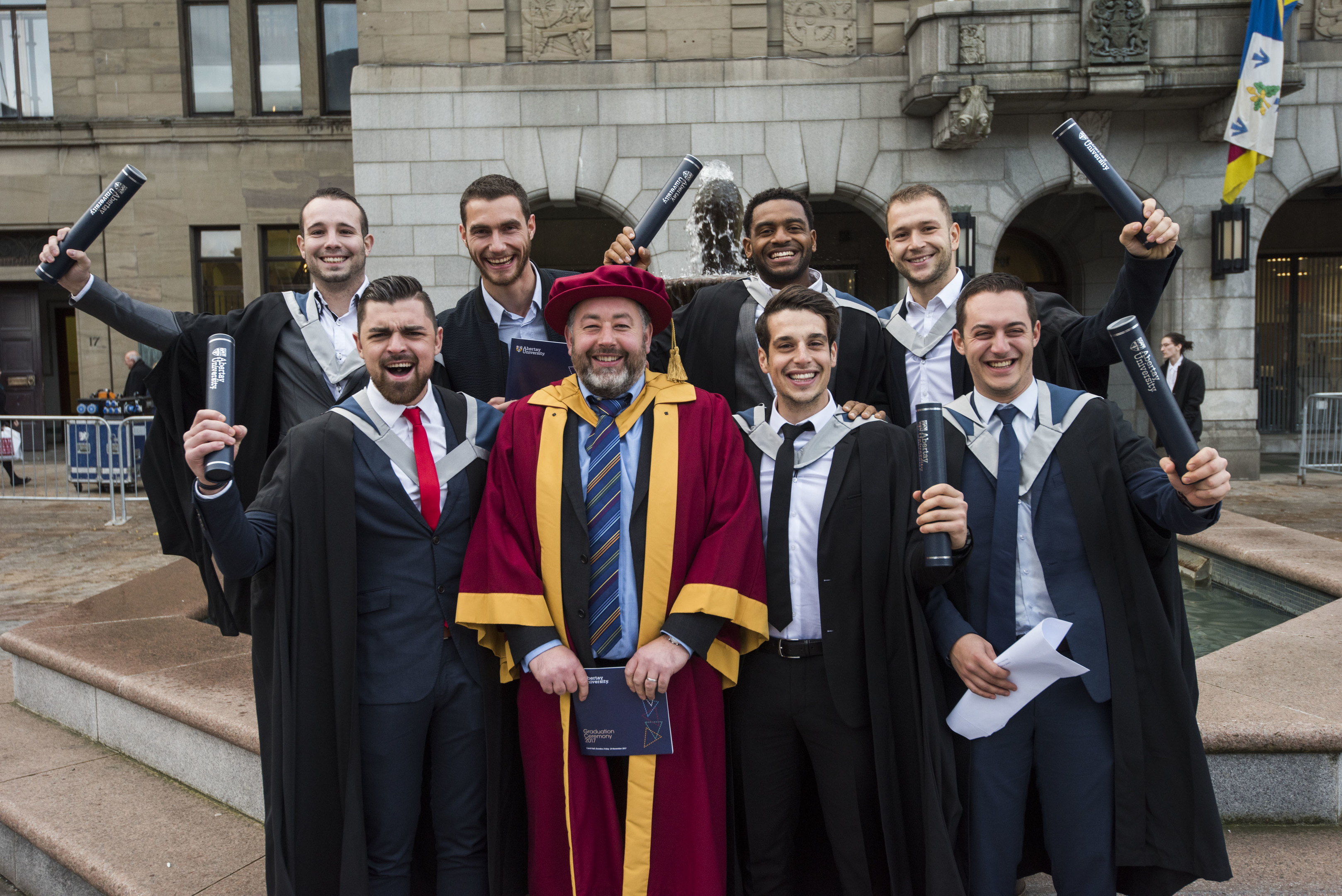 Students celebrate their success with their lecturers.