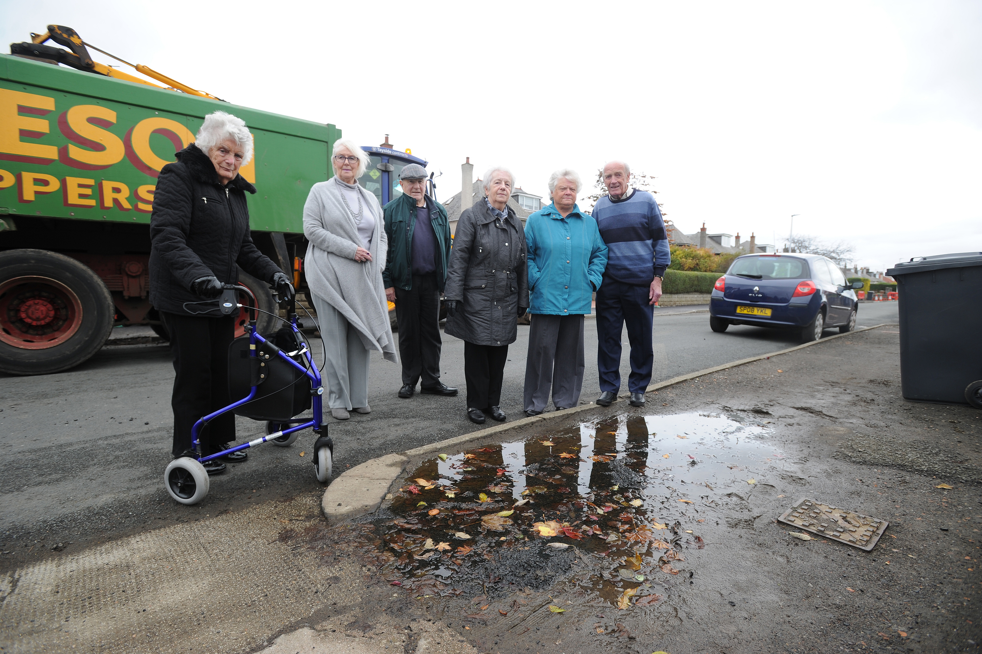 Nesbitt Street residents have signed a petition to get the council to pave one side of the road that has been in a state of disrepair for more than 20 years.