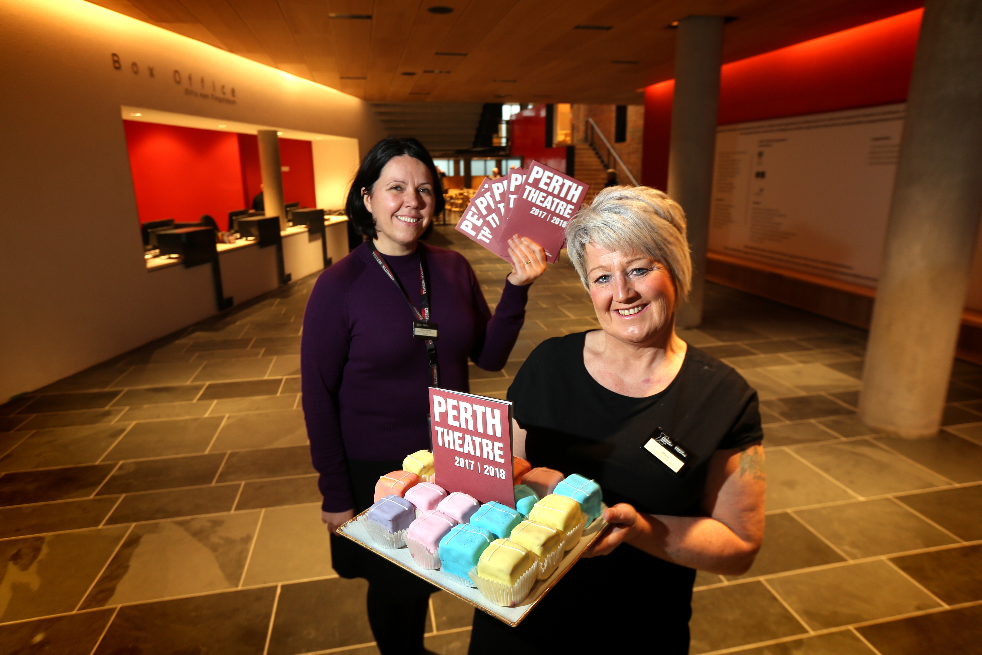 Jennie Baiilie - Marketing Manager and Allison Gormley - Catering Supervisor celebrating Perth Theatre re-opening.