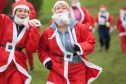 Ho! Ho! Ho! Santas of all ages took part