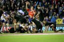 Referee Matt Carley gives Scotland's first try for Jonny Gray in the Autumn Test at Murrayfield.