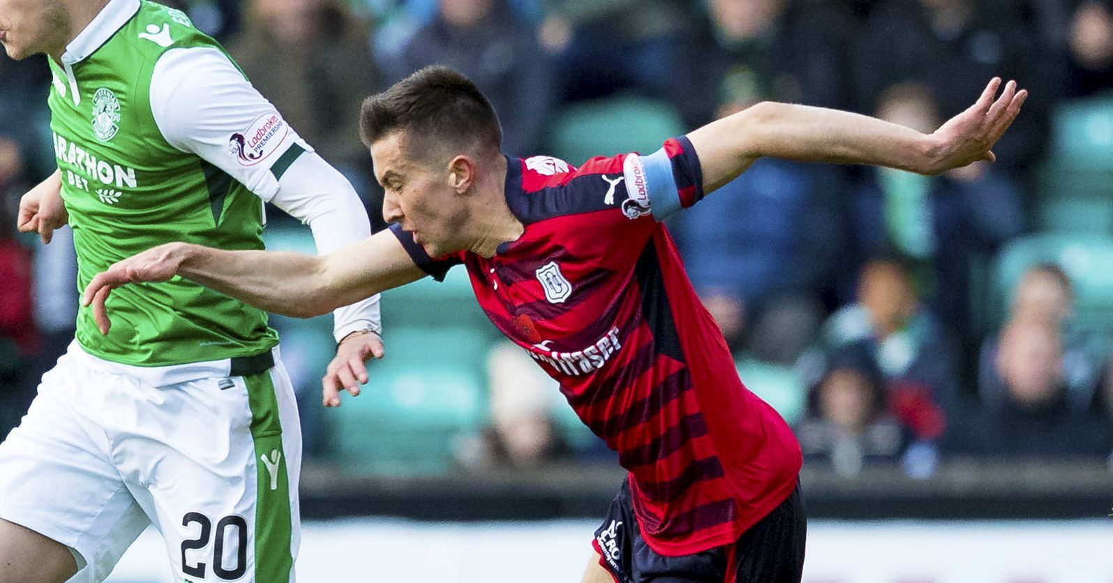 Dundee's Cammy Kerr in action against Hibs.
