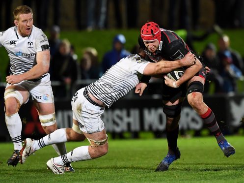 Edinburgh's Grant Gilchrist makes a powerful carry against Ospreys at Myreside.