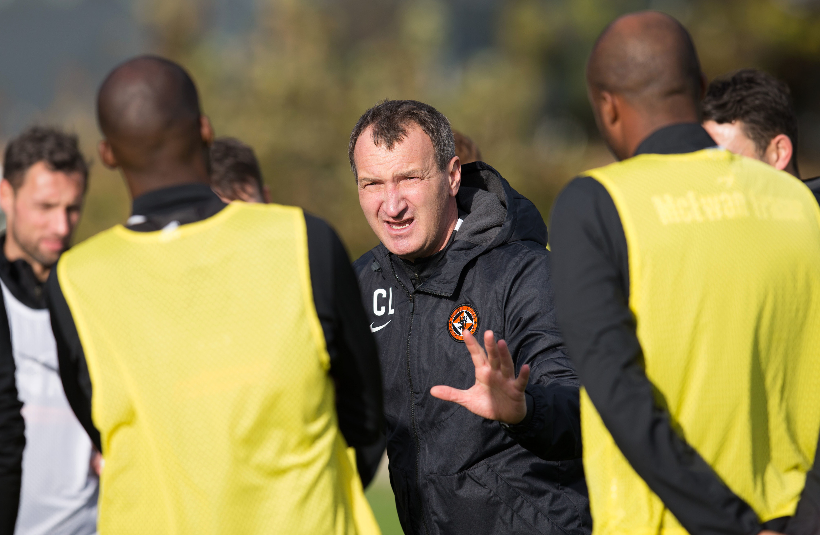 New Dundee United manager Czaba Laszlo speaks to his players during his first training session with the team.
