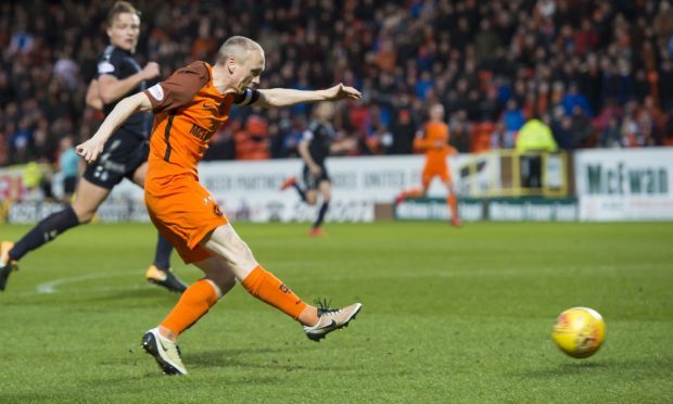 Willo Flood scores the third goal against Falkirk.