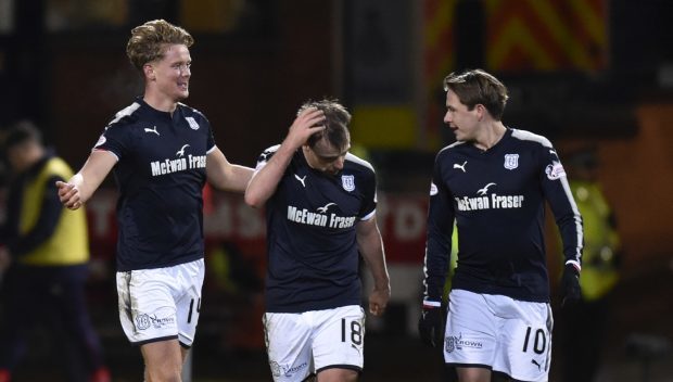 Scott Allan (right) celebrates with scorer Mark O'Hara and Paul McGowan after the second goal.