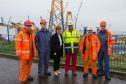 First Minister Nicola Sturgeon chats to workers and BiFab MD Martin Adam in 2018