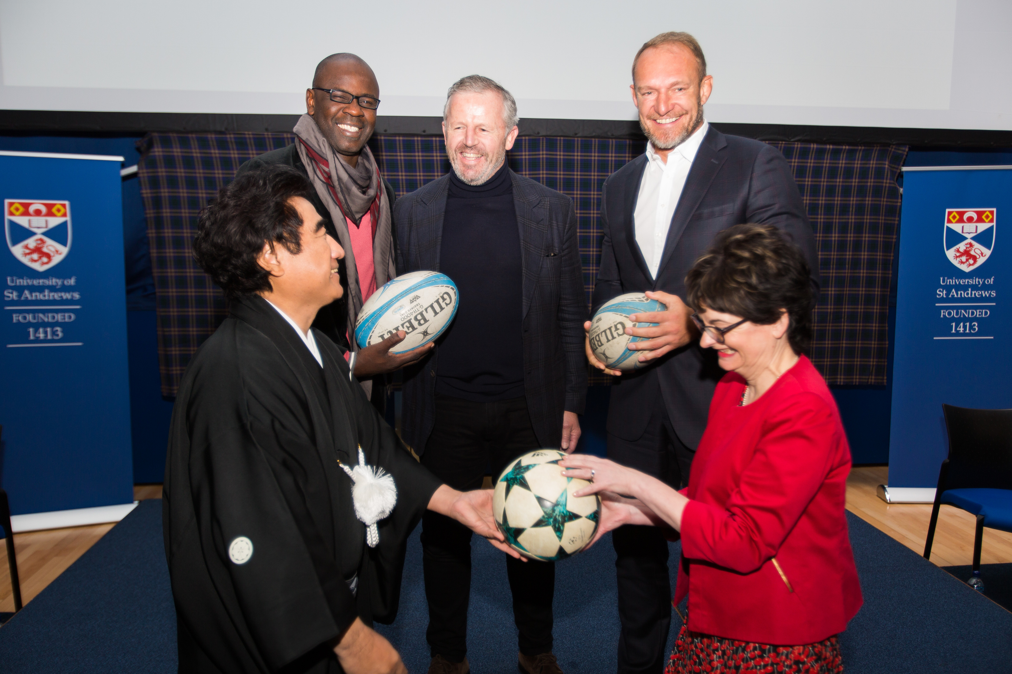 Lilian Thuram, Sean Fitzpatrick and Francois Pienaar (back) Dr Haruhisa Handa and university principal Sally Mapstone (front).