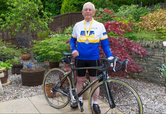 John McNally with his medal from the 2017 Etape Caledonia.