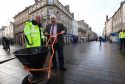 Perth and Kinross Council leader Ian Campbell tries out a gritter.