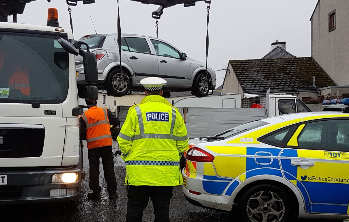 A car being removed in Fife.