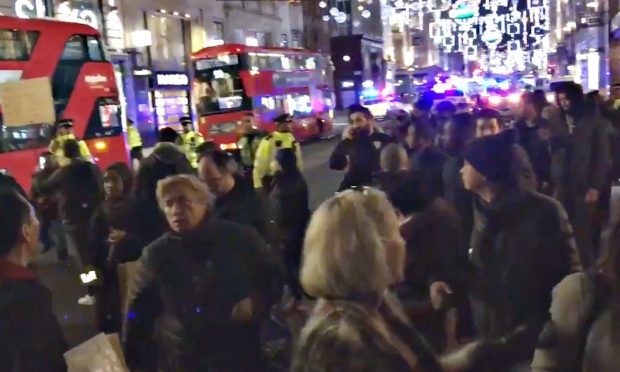 The scene near Oxford Street Station in London.