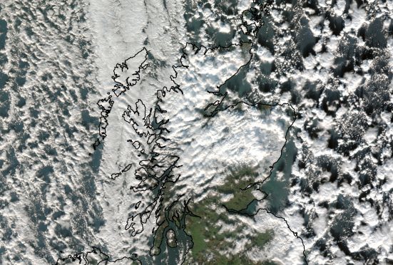 A satellite image showing snowy and cloudy scenes across Scotland.