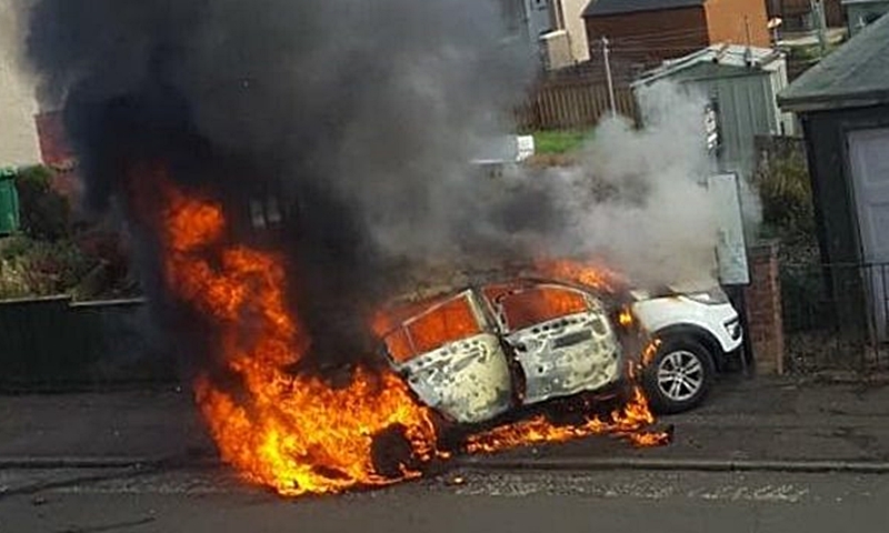 The car at the height of the blaze.