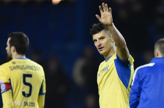 St Johnstone's Graham Cummins at full-time at Ibrox after scoring his last goal.