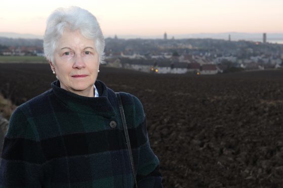 St Andrews Community Council member Penny Uprichard, pictured with St Andrews in the background.