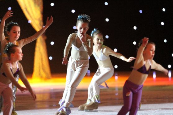 Young skaters on the ice.