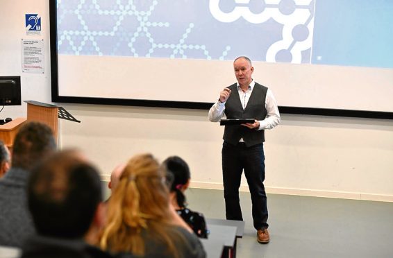 Dundee Accelerator manager Andy Campbell addresses the business showcase event at Dundee University.