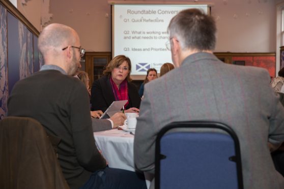 Ms Fiona Hyslop MSP Cabinet Secretary for Culture, Tourism and External Affairs joins delegates at the Carnegie Libraries and Museums Dunfermline engage in round table conversations as part of a Scottish Government partnership with Fife Cultural Trust as part of its programme of early engagement supporting the development of a cultural strategy for Scotland.