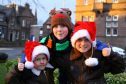 William McDonald, 6, Alex McFarlane, 12, and Andrew McDonald, 8,  at the Brechin Christmas lights event.