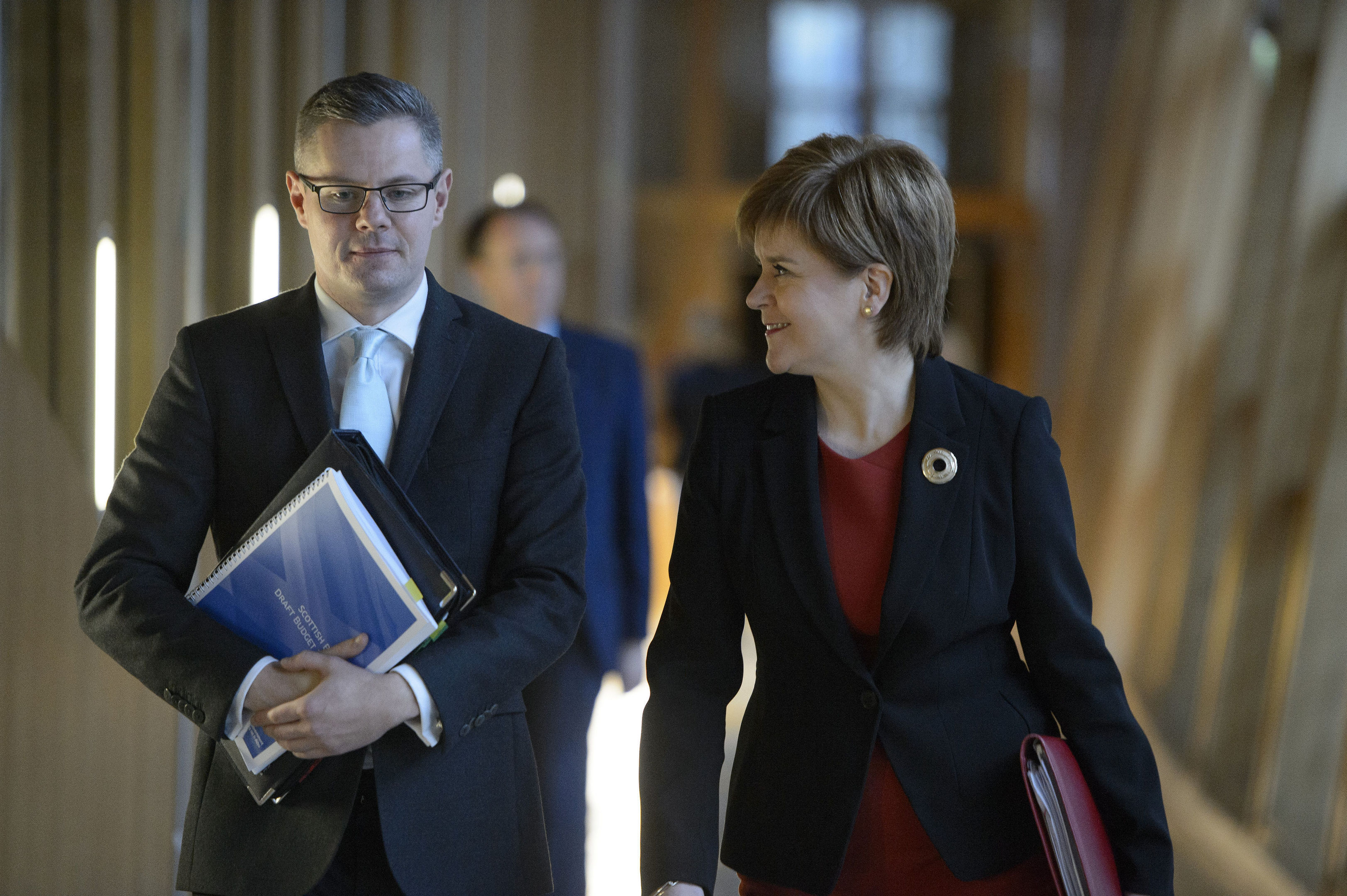First Minister Nicola Sturgeon and Finance Secretary Derek Mackay arrive to deliver his draft Budget for 2018-19 at the Scottish Parliament.