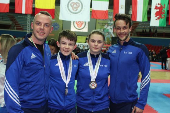 Roy O'Kane (coach), Oliver Bruce, Leah Dunn and Dan Woods (coach)