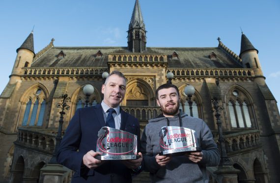 Stewart Petrie and Cammy Ballantyne with their awards.