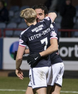 A-Jay Leitch-Smith celebrates with Sofien Moussa on Saturday.