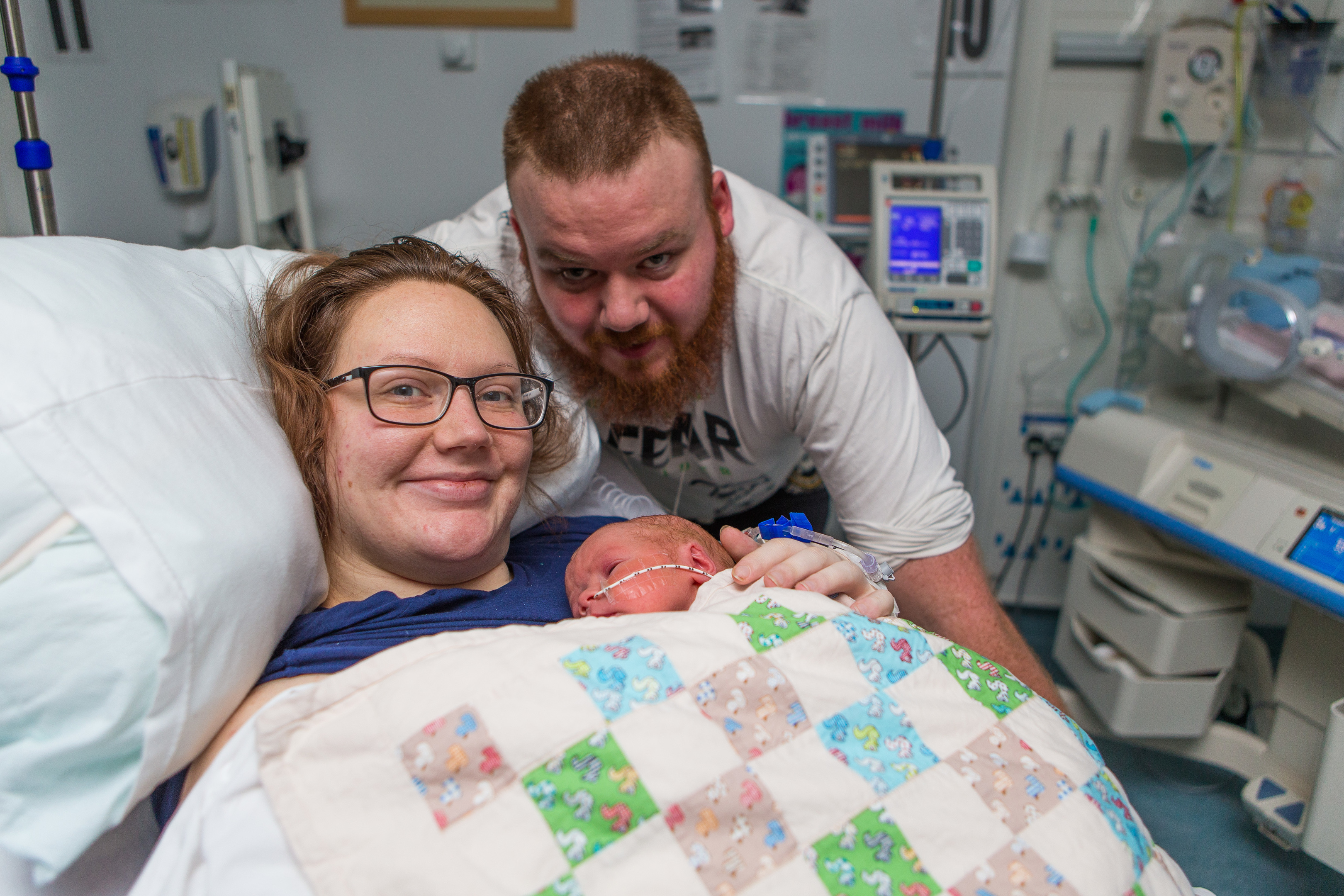 Stacey Macmillan and Jed Edgar with their baby boy.