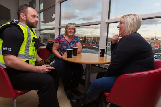 Sgt Paul Gillespie speaks to Leven residents Morag Paterson and Yvonne Davidson