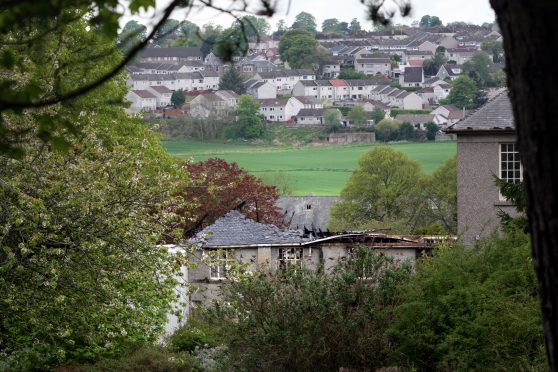 Strathmartine Hospital is in an advanced state of decay and has been targeted by fire-raisers while planning negotiations are ongoing.