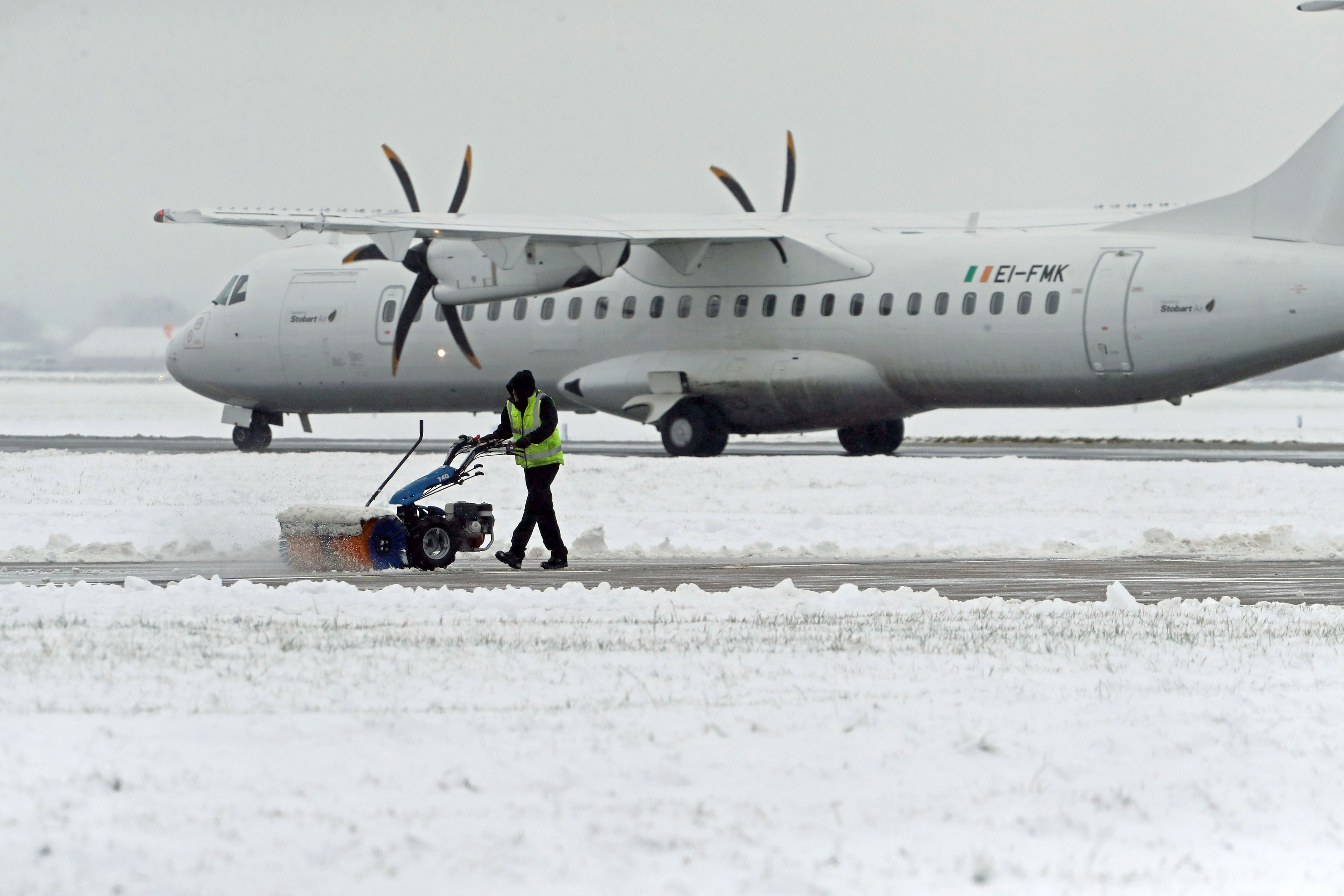 The runway and grounds at Glasgow Airport being cleared of snow in 2017