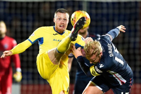 Goalscorer Denny Johnstone in action.