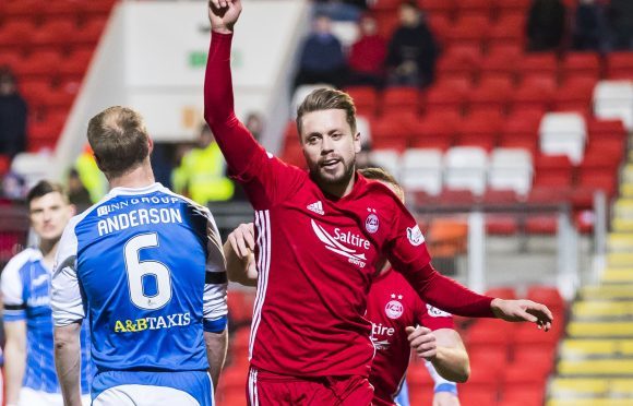 Aberdeen's Kari Arnason celebrates his goal.