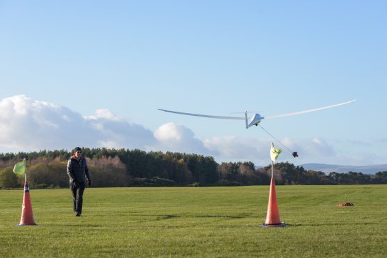 Stock image of a glider taking off at Portmoak Airfield.